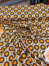 Load image into Gallery viewer, Folk art sun faces digital cotton jersey
