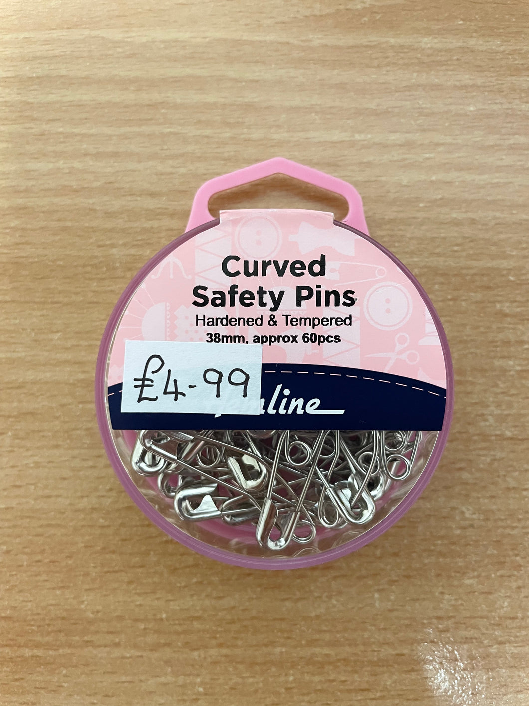 Curved safety pins